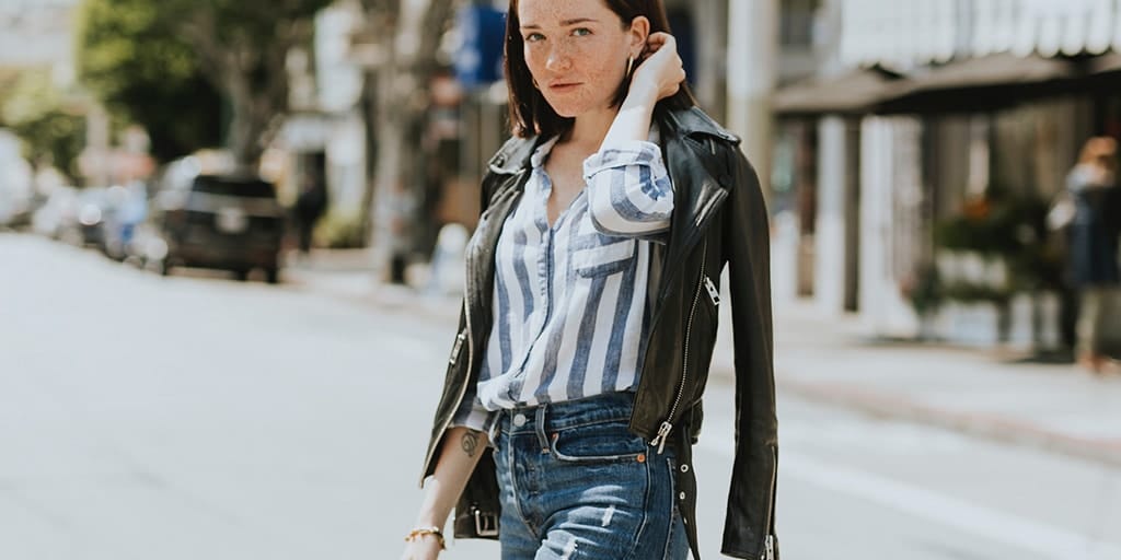 Woman wearing striped shirt with jeans