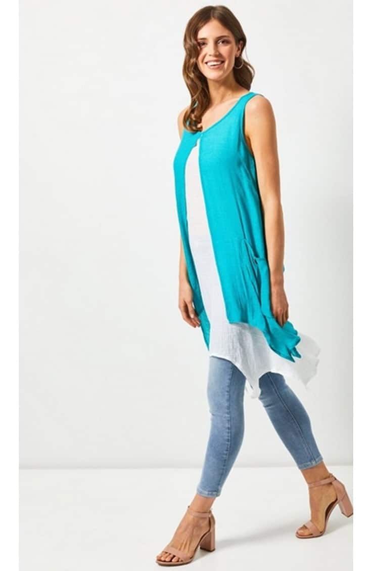 Layered tunic paired with skinny jeans