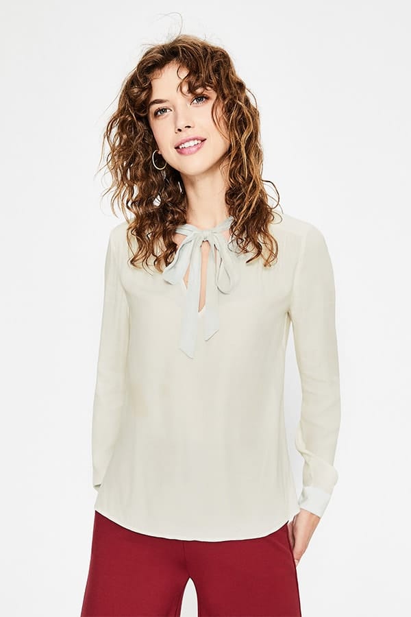 Tie neck blouse in cream 