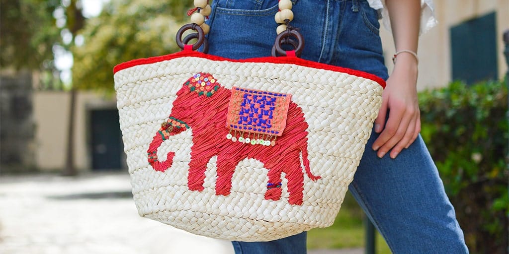 Colorful handbag featuring elephant pattern