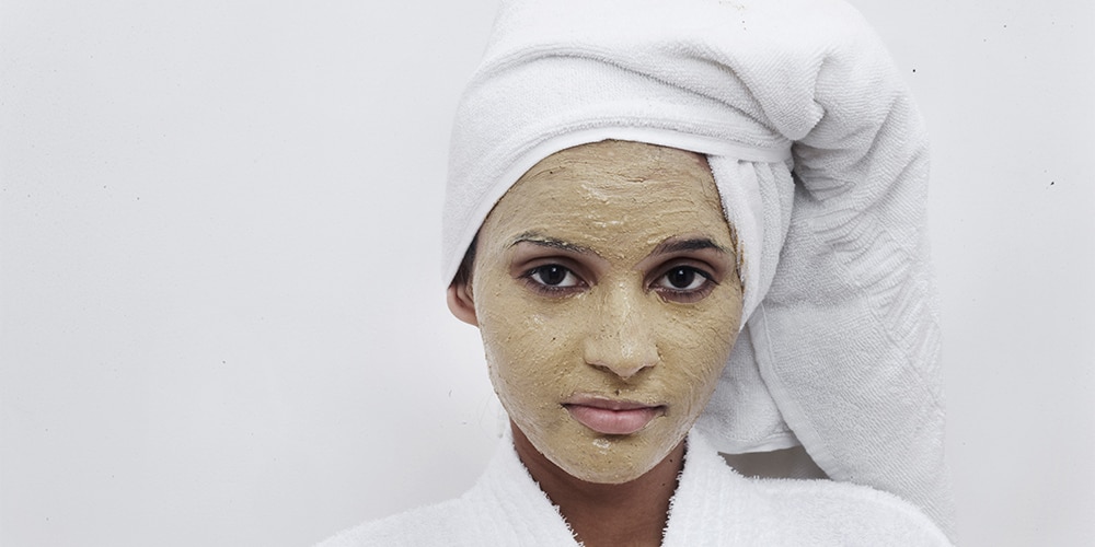 Woman with facial scrub