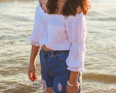 Woman wearing high-waisted denim shorts