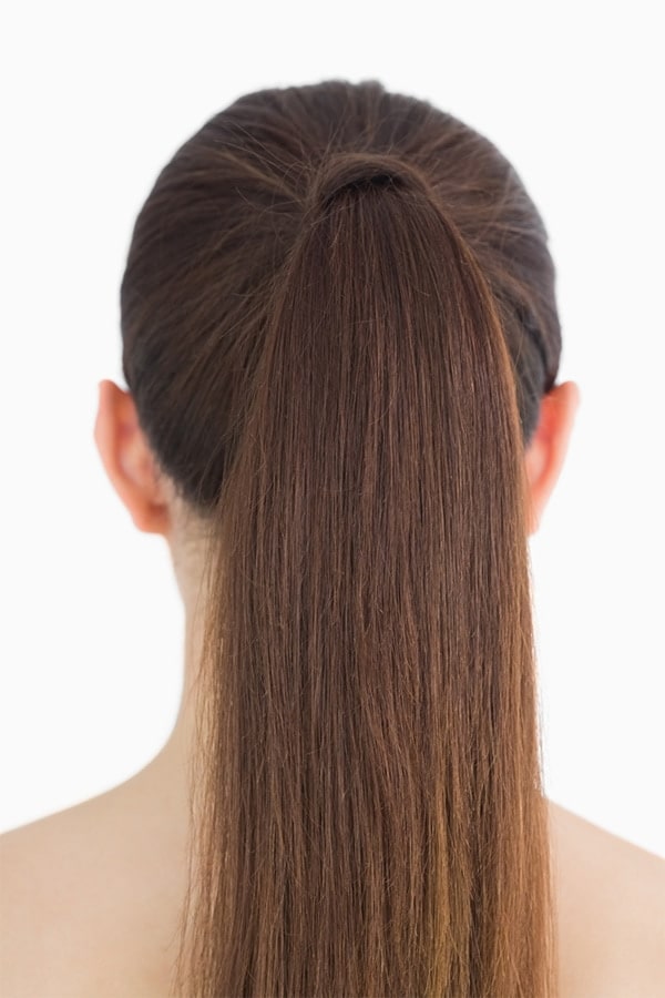 Woman with hair pulled back
