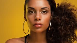 Woman wearing large hoops