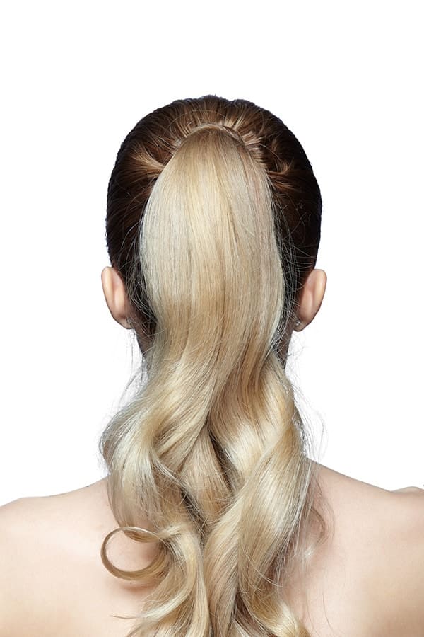 Woman with long hair in ponytail