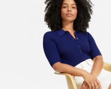 Woman wearing ribbed sweater by Everlane