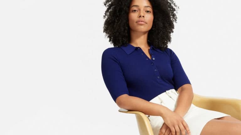 Woman wearing ribbed sweater by Everlane