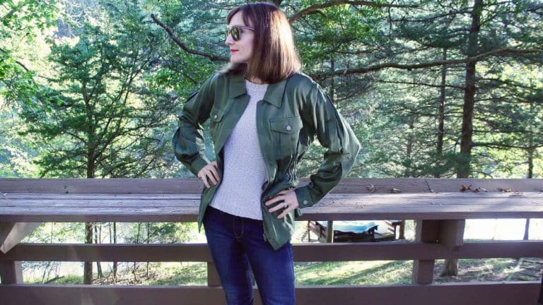 Catherine Brock wearing a military jacket rented from haverdash