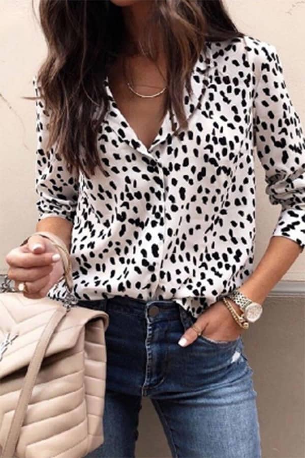 Woman wearing leopard print blouse