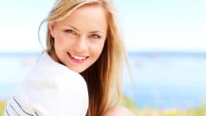 Woman with glowing cheeks