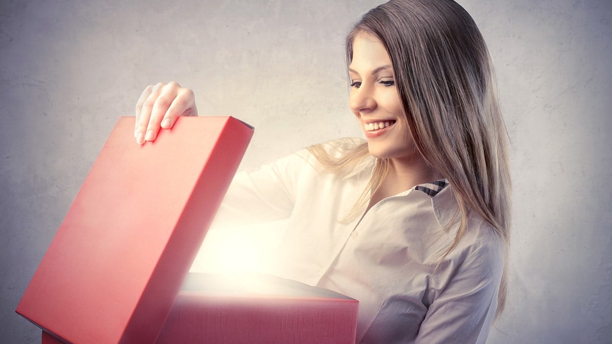 Woman opening box