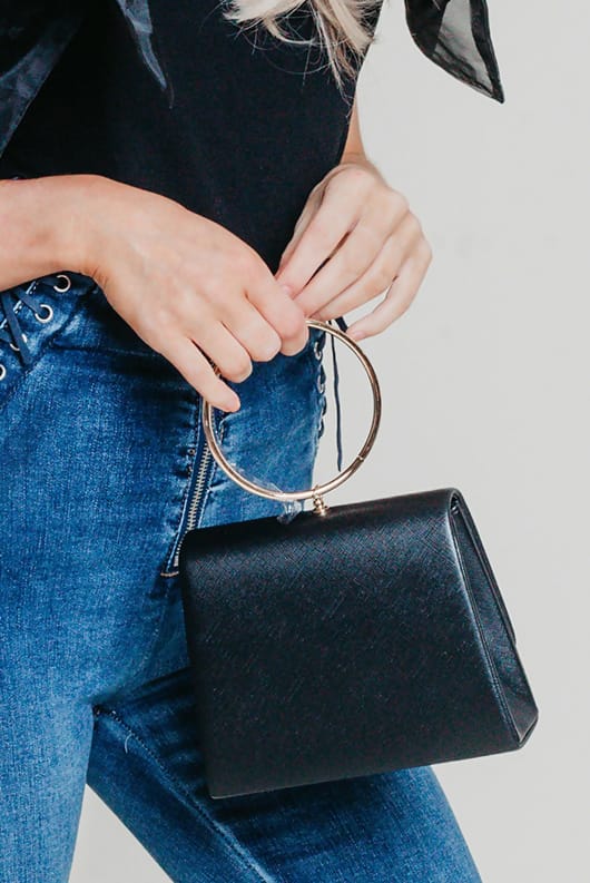Black mini bag with gold ring handle 
