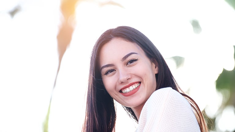 Smiling woman outside