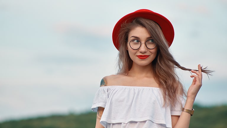 Girl with dry hair smiling.