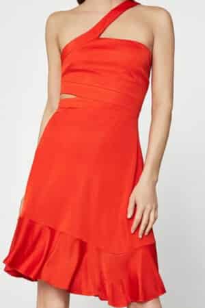 One-shoulder red dress with side cutout and flounce hemline.