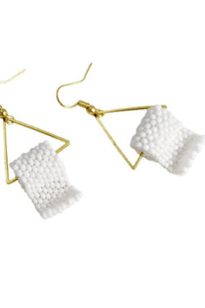 Toilet paper earrings from Megna Petersen Jewelry.