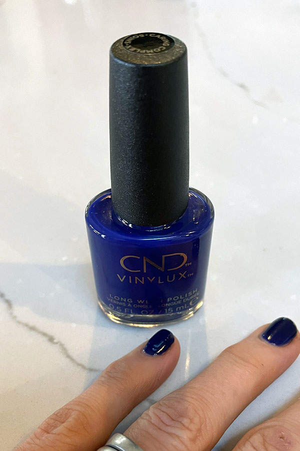 Dark blue nail polish by CND.