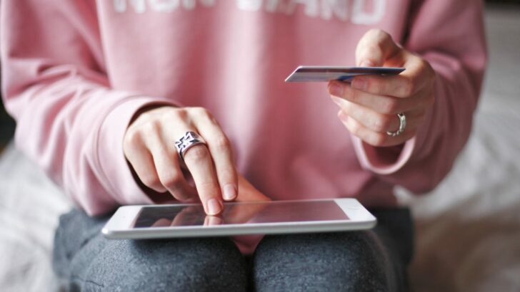 Close up of woman shopping online.