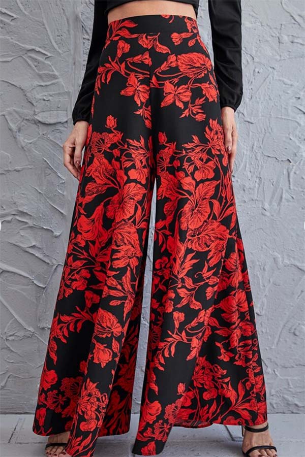 Close-up product shot of red floral wide-legged pant.