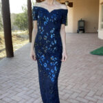 Catherine Brock wearing formal navy and sequin dress from Amazon.