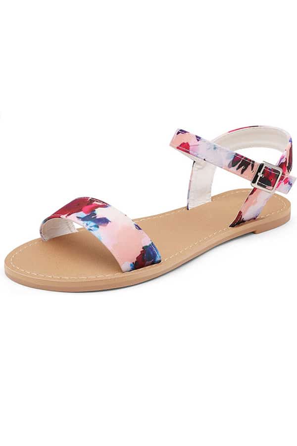Product shot of floral flat sandal.