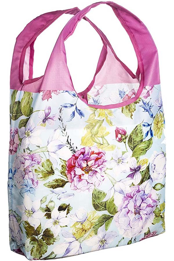 Floral reusable grocery bag with pink handle.