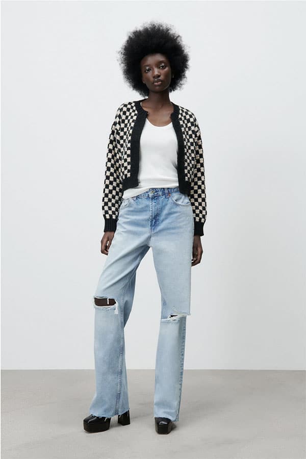 Retro Fashion: 10 Budget-Friendly Accessories + Essential Style Tips 6 Model wearing knit checkered cardigan.
