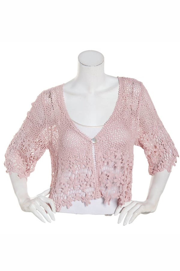 Retro Fashion: 10 Budget-Friendly Accessories + Essential Style Tips 7 Pink lace shrug on mannequin.