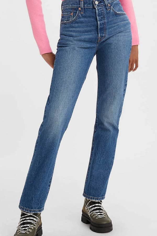 Model wears Levi's 501 jeans, which are on sale for Labor Day.