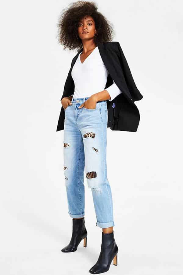 Model wears black blazer that's on sale for Labor Day.