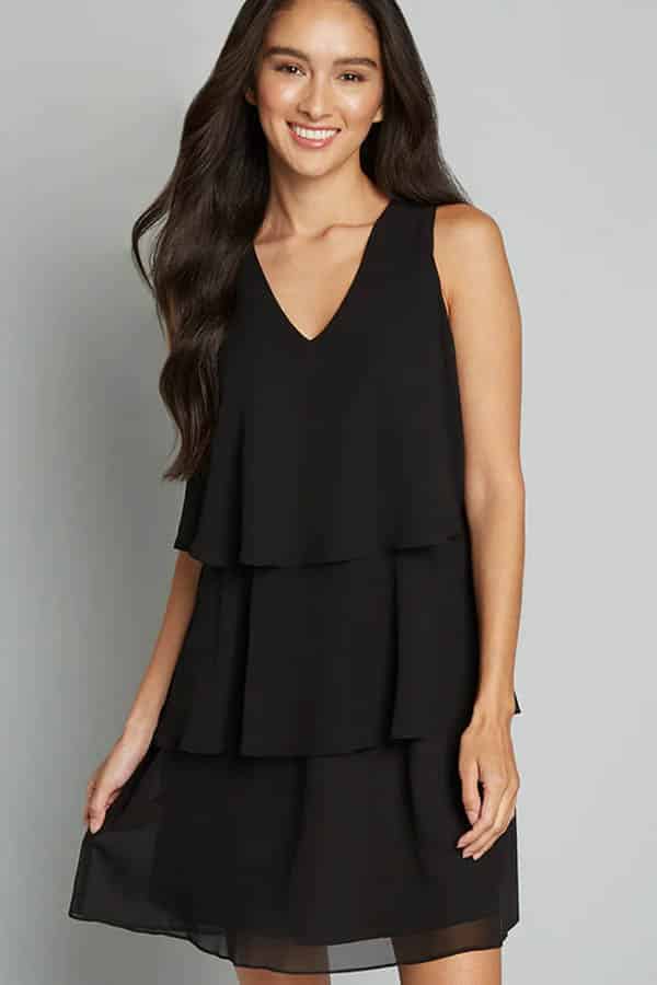 Model wears black shift dress discounted during Labor Day sale at Modcloth.
