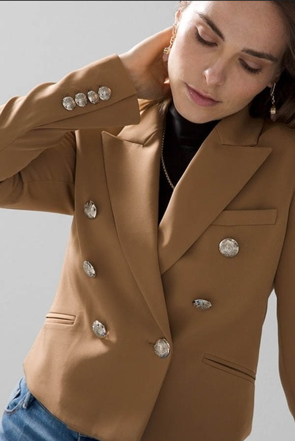 Close up of women wearing cropped blazer. 