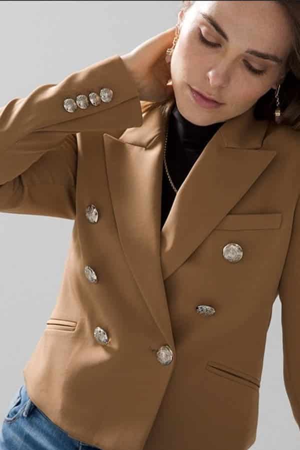 Close up of women wearing cropped blazer.