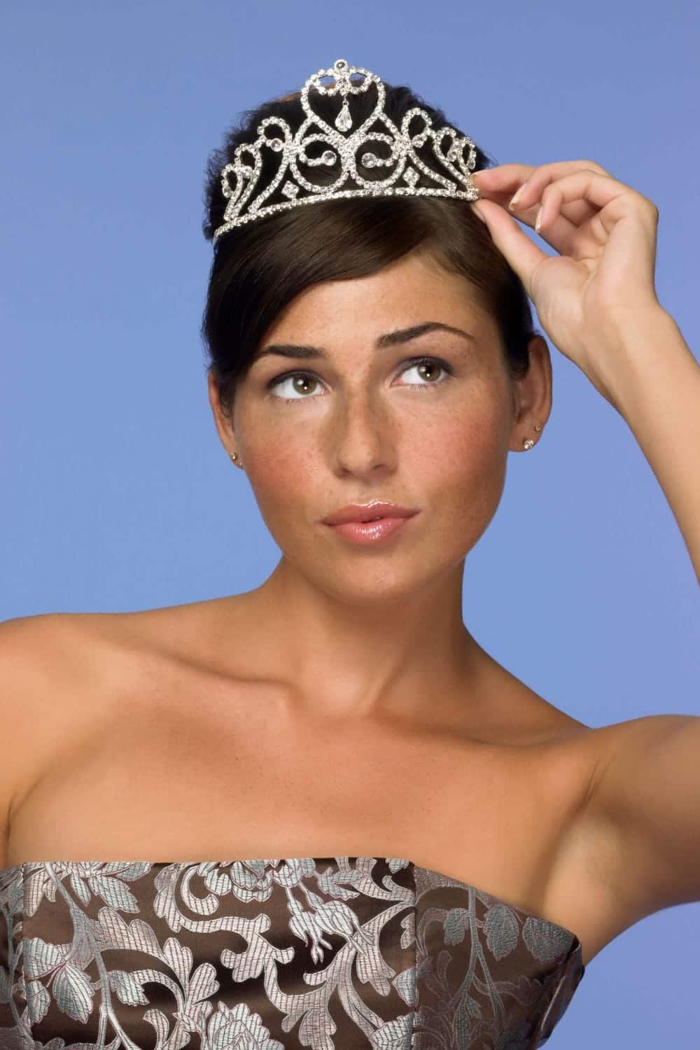 11 Brilliant Budget Halloween Costume Ideas 1 Close up of woman wearing tiara and formal dress.
