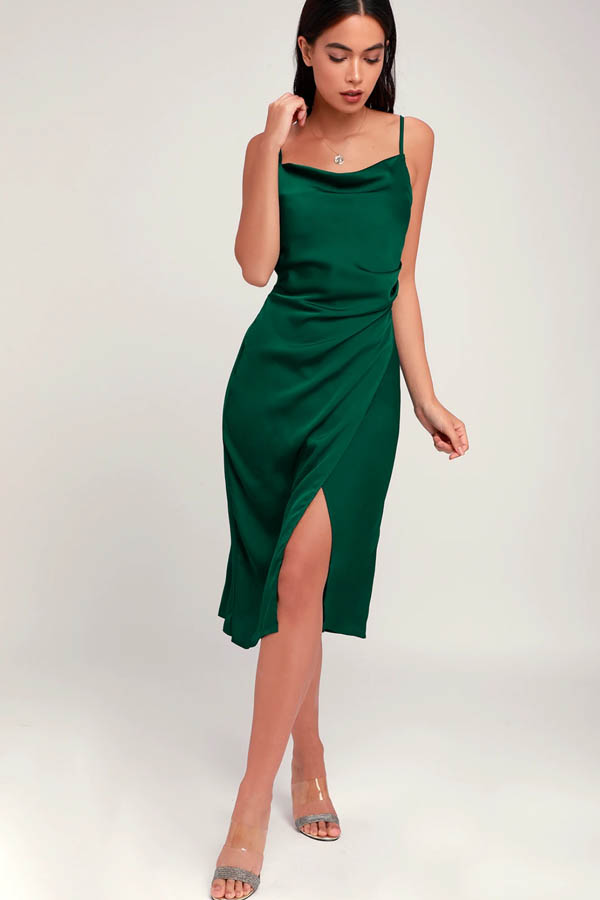 Model wears forest green dress from online store Lulu's.