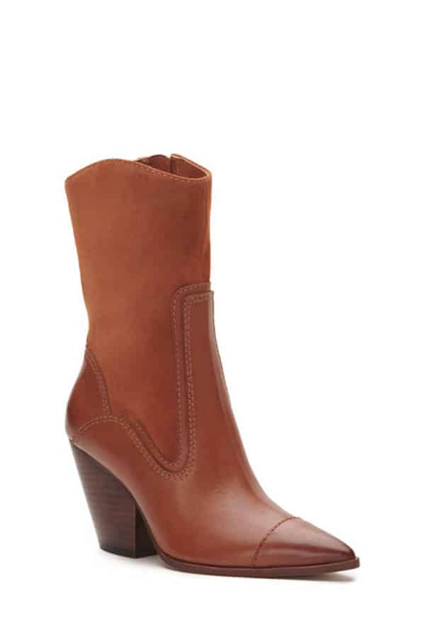 Camel boot by Vince Camuto on white background.