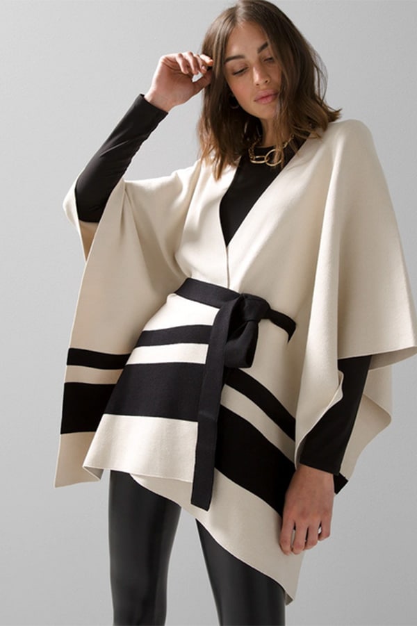 Black and white ruana with waist belt.