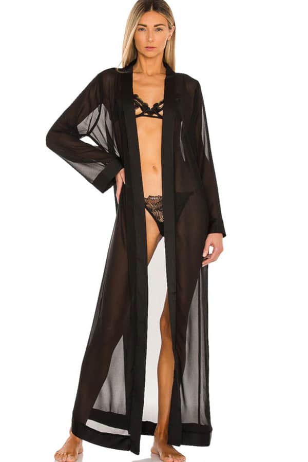 Model wears long, sheer sexy robe.