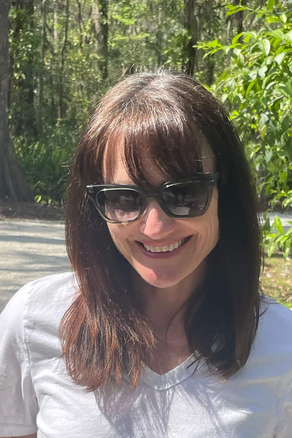 Head shot of Catherine Brock smiling outside.