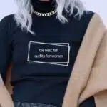 Close up of woman wearing sweater with text overlay that reads: the best fall outfits for women.
