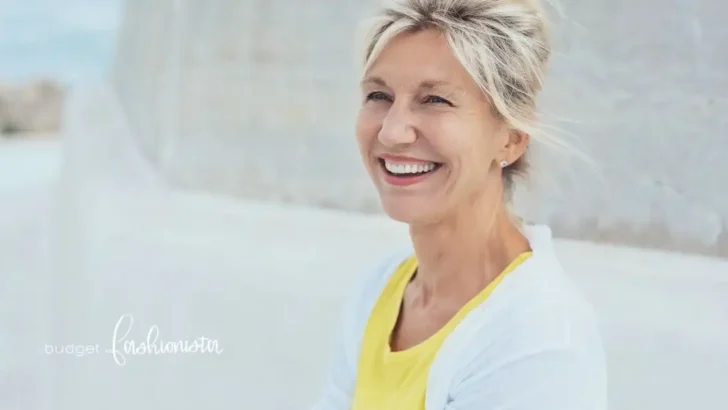 Smiling older woman outside.