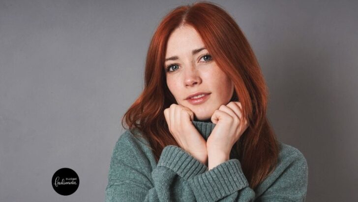 Woman wearing green turtleneck.