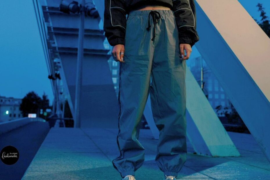 Jogger pants with black cropped jacket.