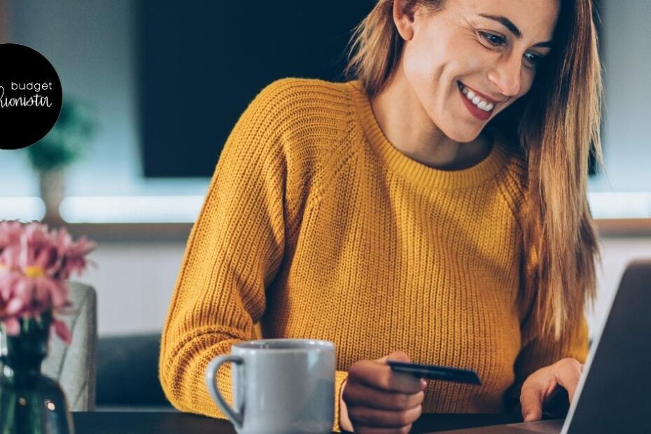Woman smiling while shopping online.
