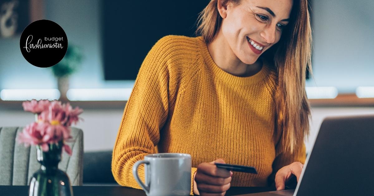 Woman smiling while shopping online.