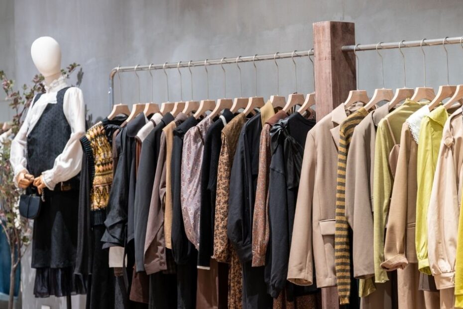 Clothing display with neutral tones on hangers