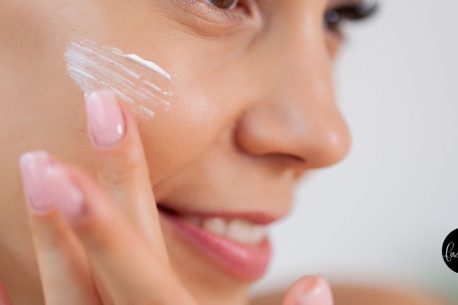 Close up of woman's face with application of clinical skincare