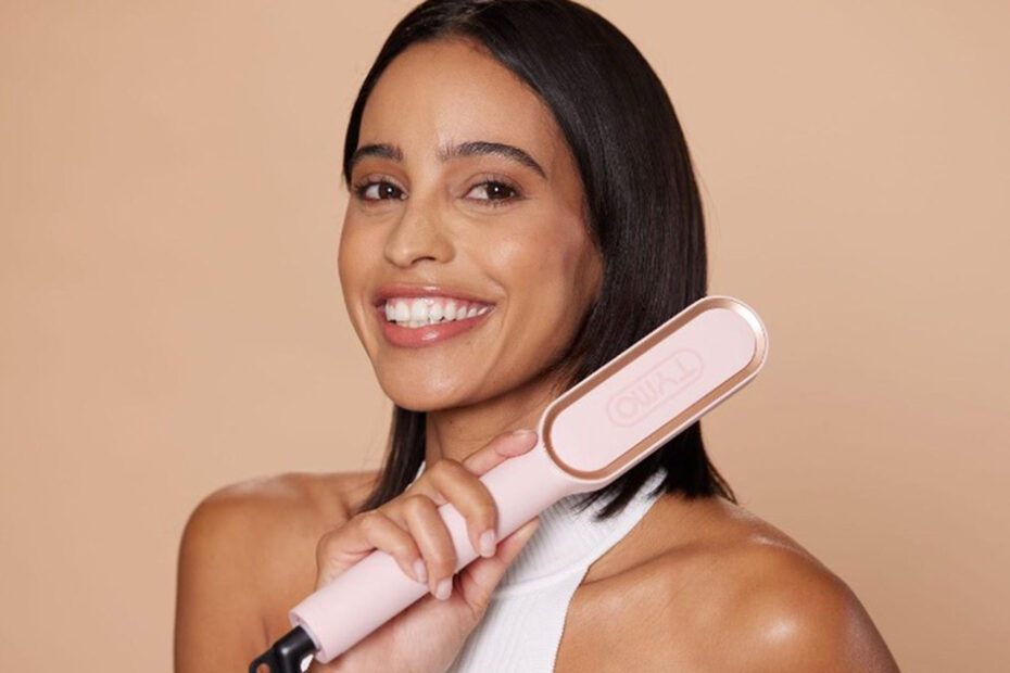 Woman holding tymo straightener