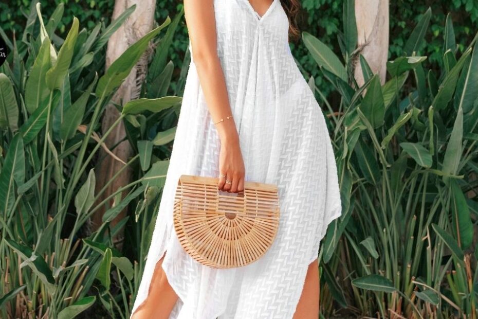 Woman wearing white shark bite dress