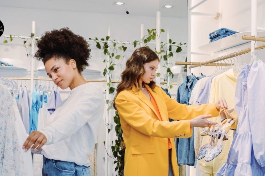 Women shopping inside clothing store